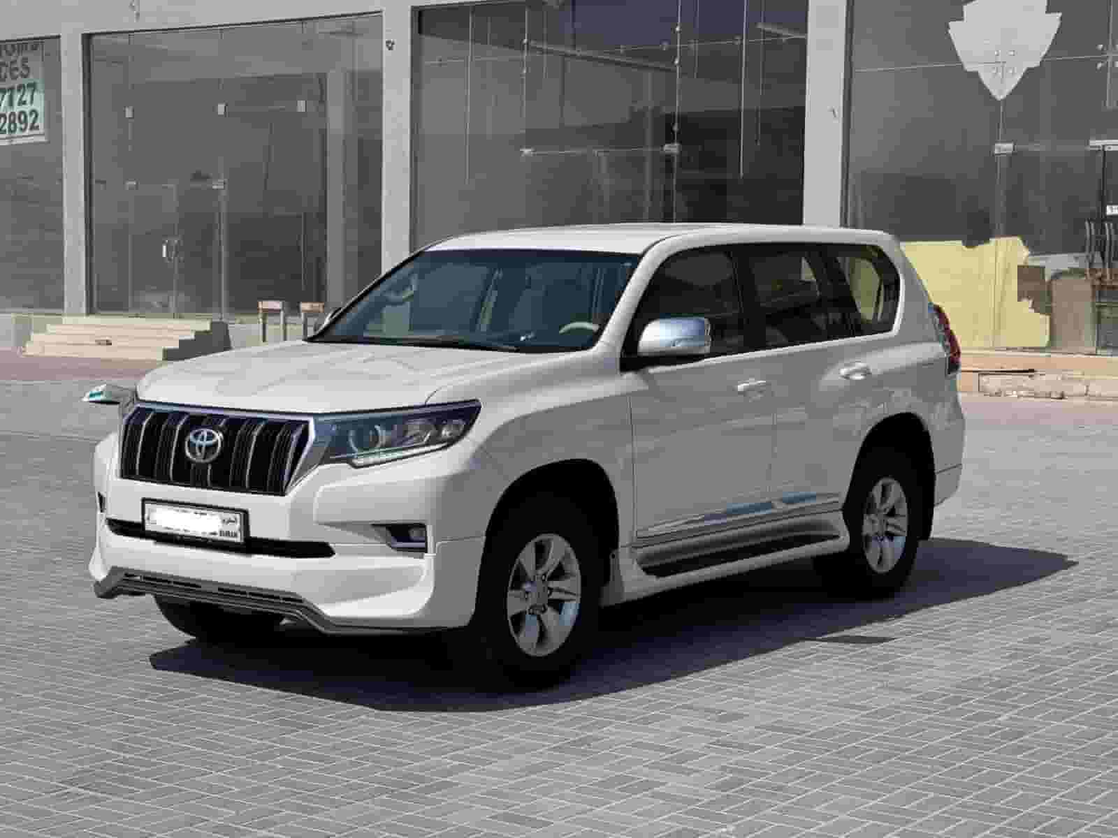 2019 تويوتا برادو TX-L (أبيض)