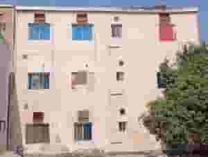 بناية للبيع بمنطقة ام الحصم 87م