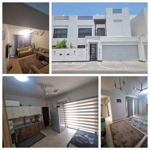 A semi-furnished villa for rent in Durrat Al-Muharraq with electricity 