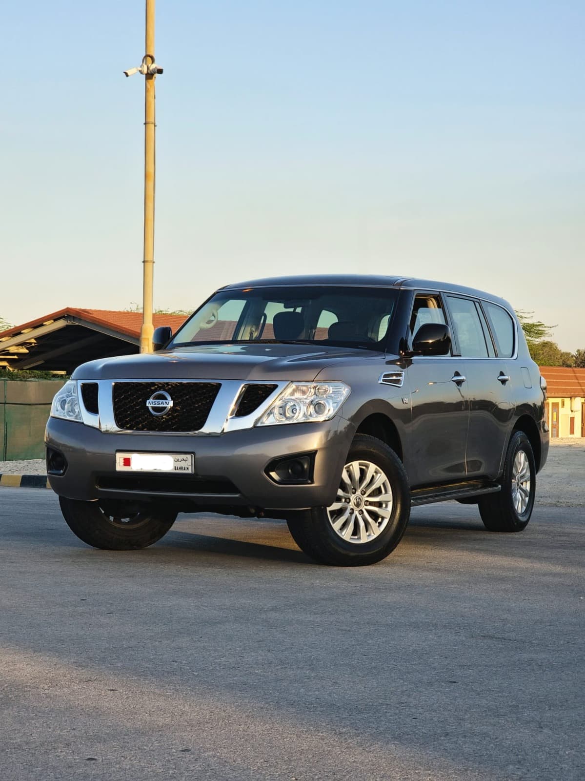 نيسان باترول XE 2015 (بني) 4