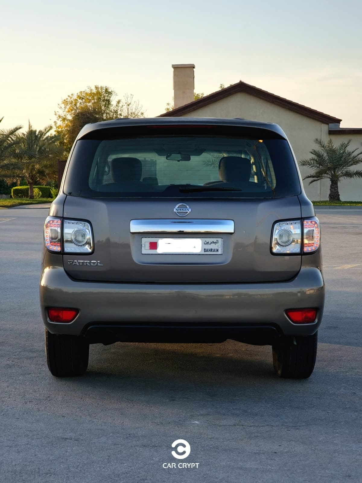 نيسان باترول XE 2015 (بني) 3
